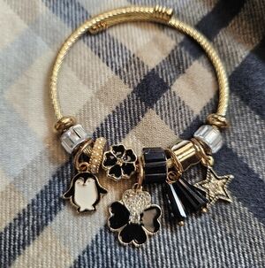 Gold and Black Tone Charm Bracelet